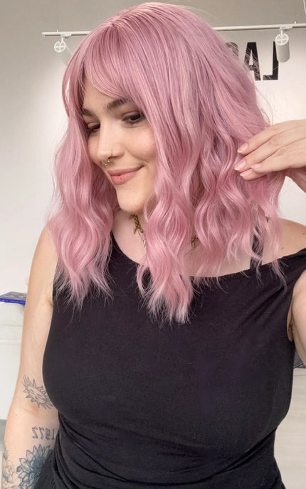 wavy pink hair synthetic, middle part with heat safe fibres, natrual pink synthetic wig australia, gold coast.