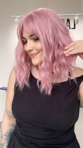 wavy pink hair synthetic, middle part with heat safe fibres, natrual pink synthetic wig australia, gold coast.