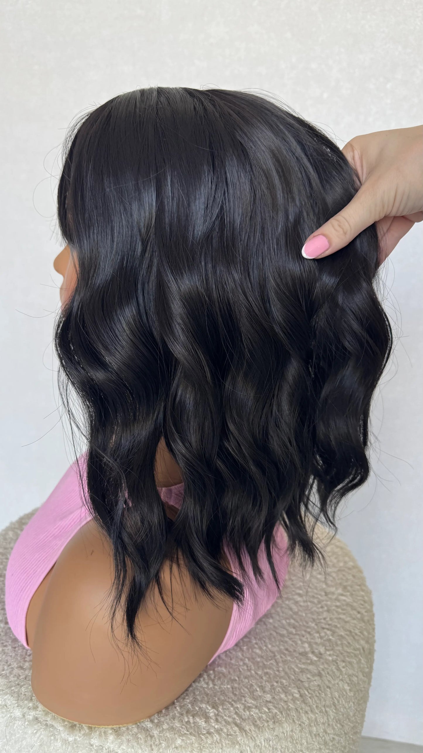 holding  black wavy hair, fringe synthetic wig australia.