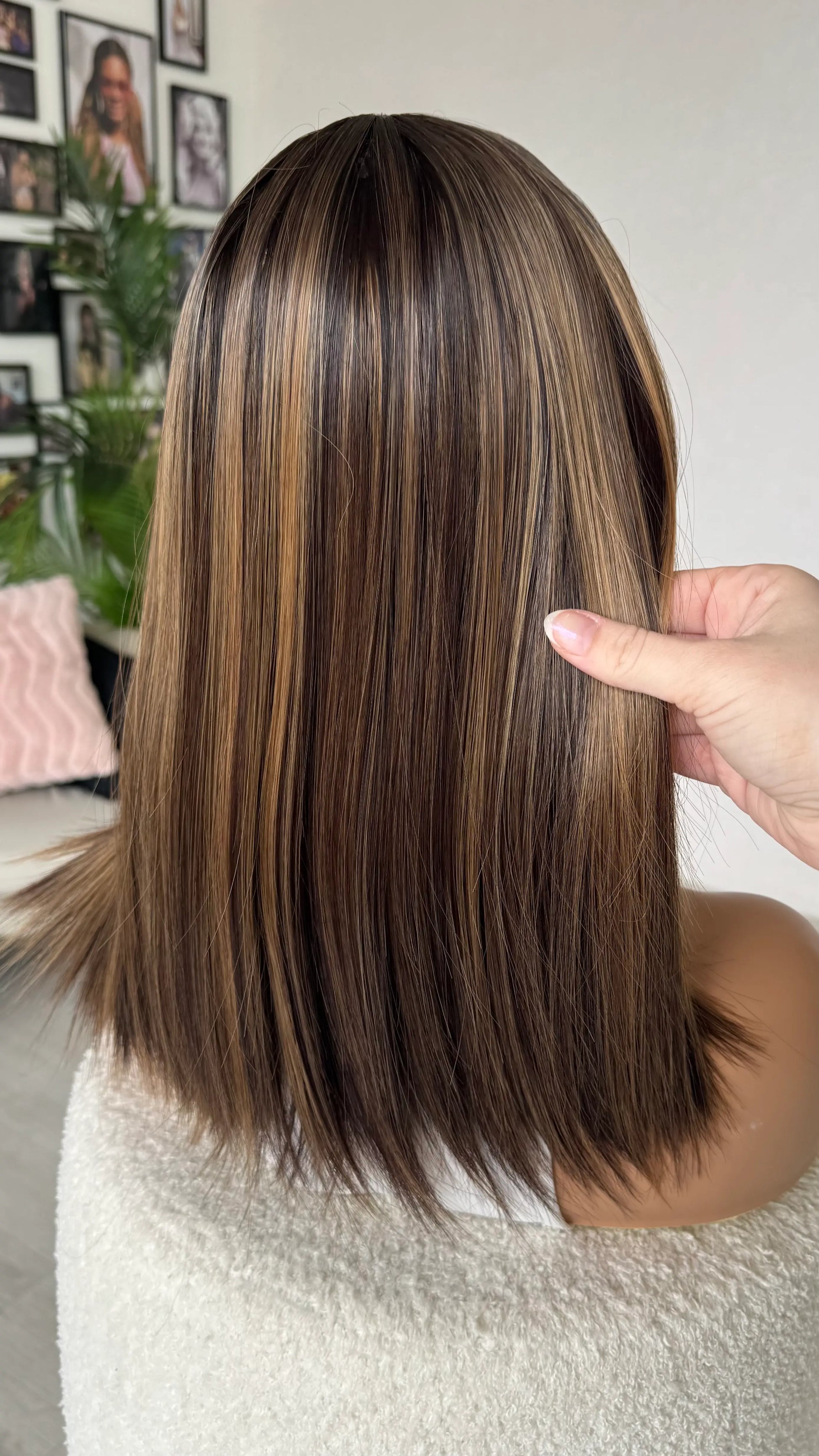 zoe wig from behind, long bob length hair, brunette with golden highlights.