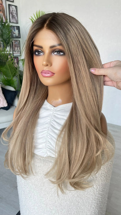 lacefront brazilian remy hair, holding the long ash blonde hair, darker root middle part.