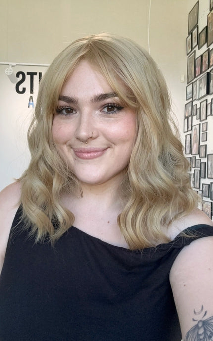 wavy hair heat safe topper honey blonde with fringe, middle part.