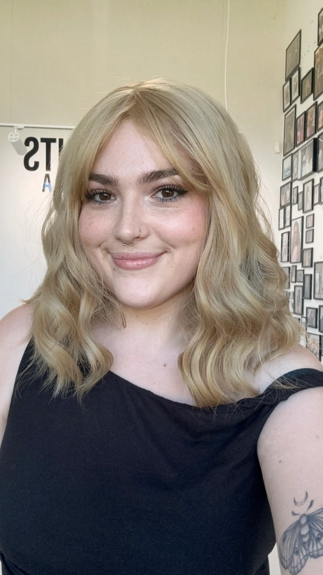wavy hair heat safe topper honey blonde with fringe, middle part.