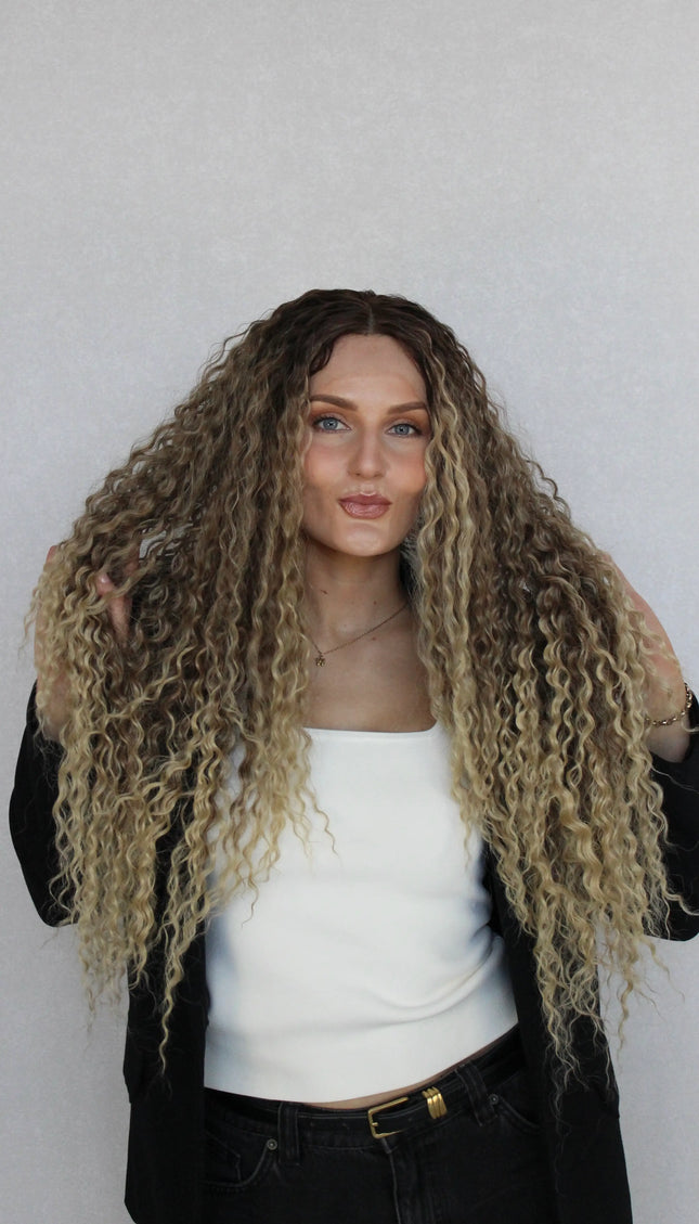 lacefront curly wig, synthetic hair, brown to ombre blonde, middle part.