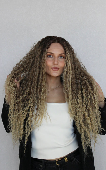 lacefront curly wig, synthetic hair, brown to ombre blonde, middle part.
