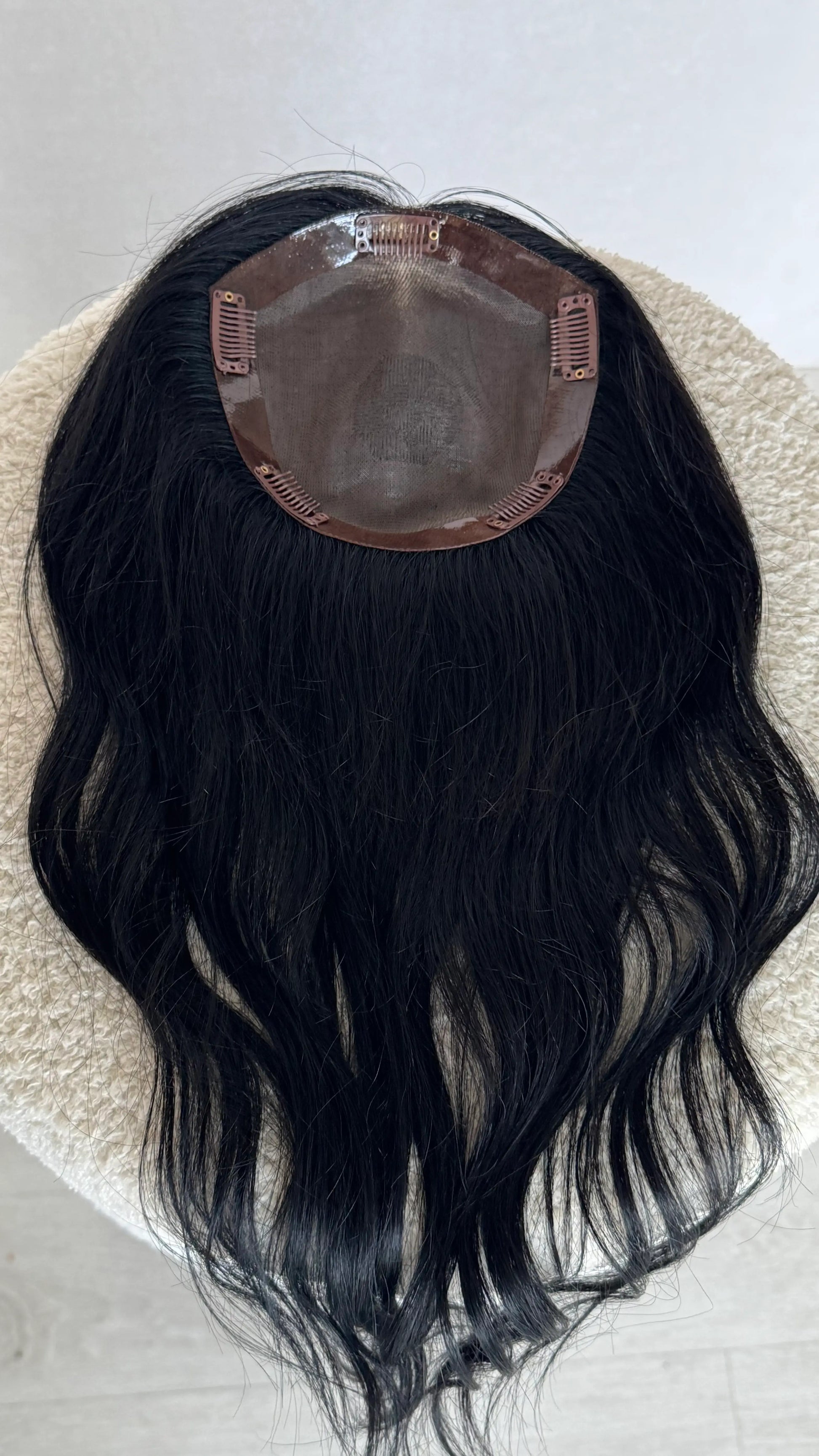 inside black monofillament topper, 20 inch hair length. australia toppers.