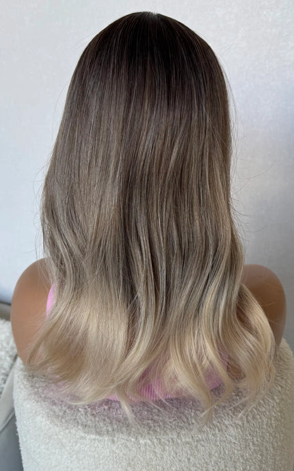 3 colour ombre dark root to platinum blonde.