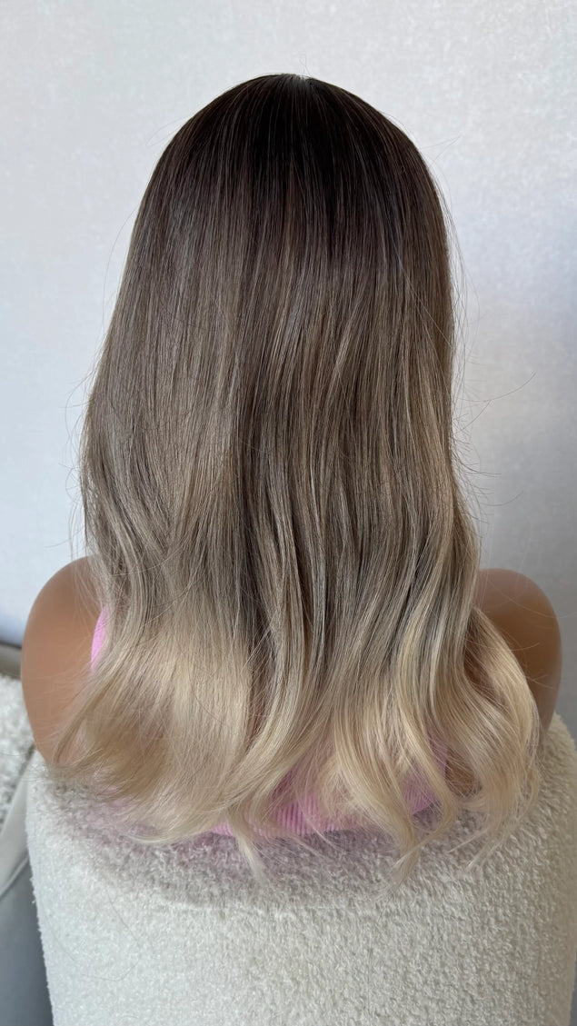 3 colour ombre dark root to platinum blonde.