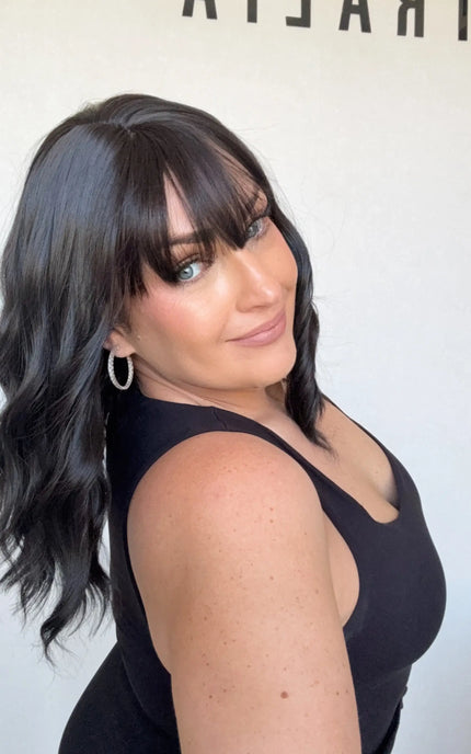 middle part wavy black hair topper. heat safe synthetic hair australia.
