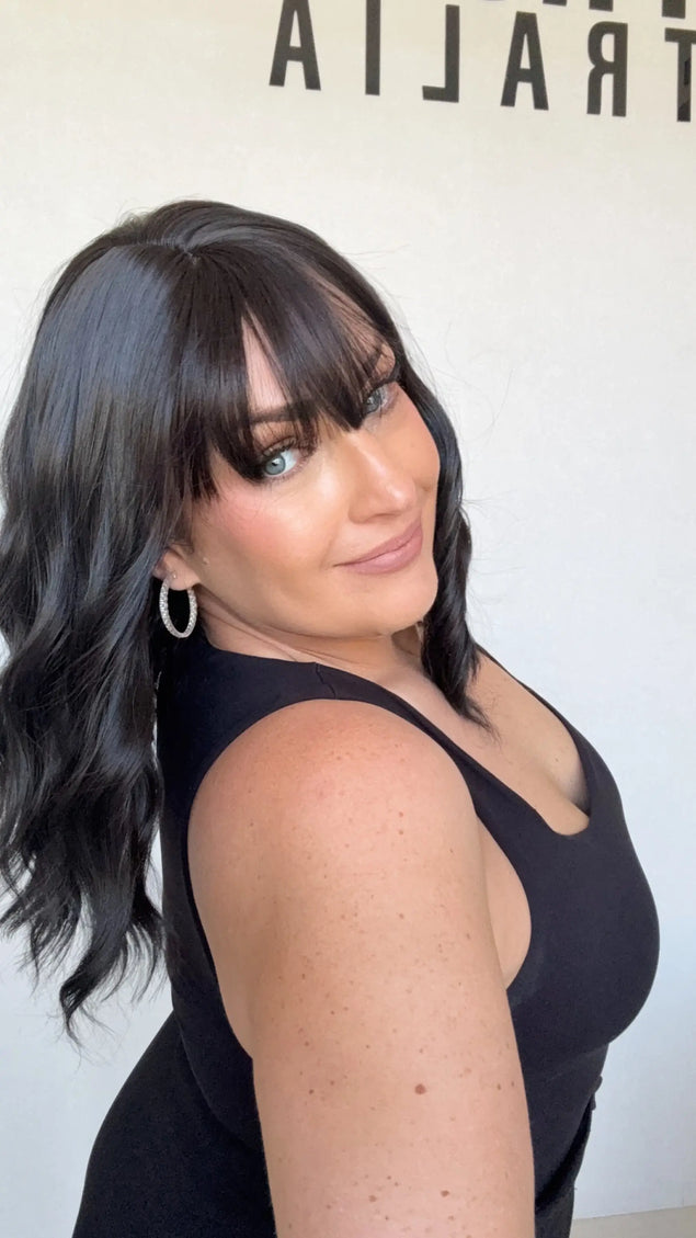 middle part wavy black hair topper. heat safe synthetic hair australia.