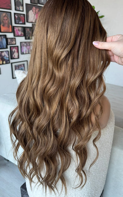 natural lace front human hair wig long length wavy brunette.