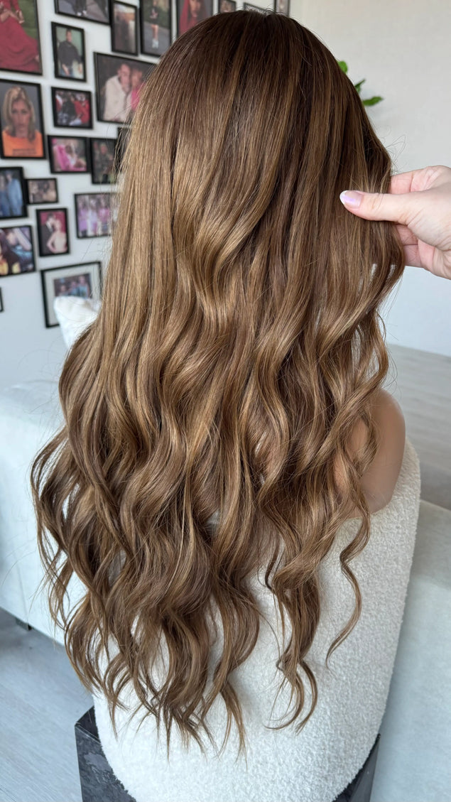 natural lace front human hair wig long length wavy brunette.