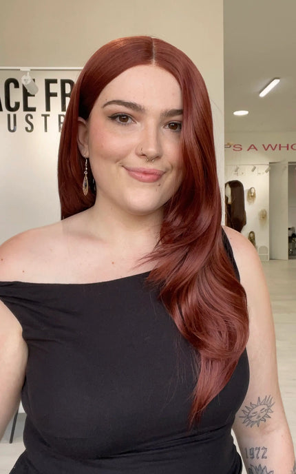 red hair lace front wig with a glueless cap and heat safe hair.