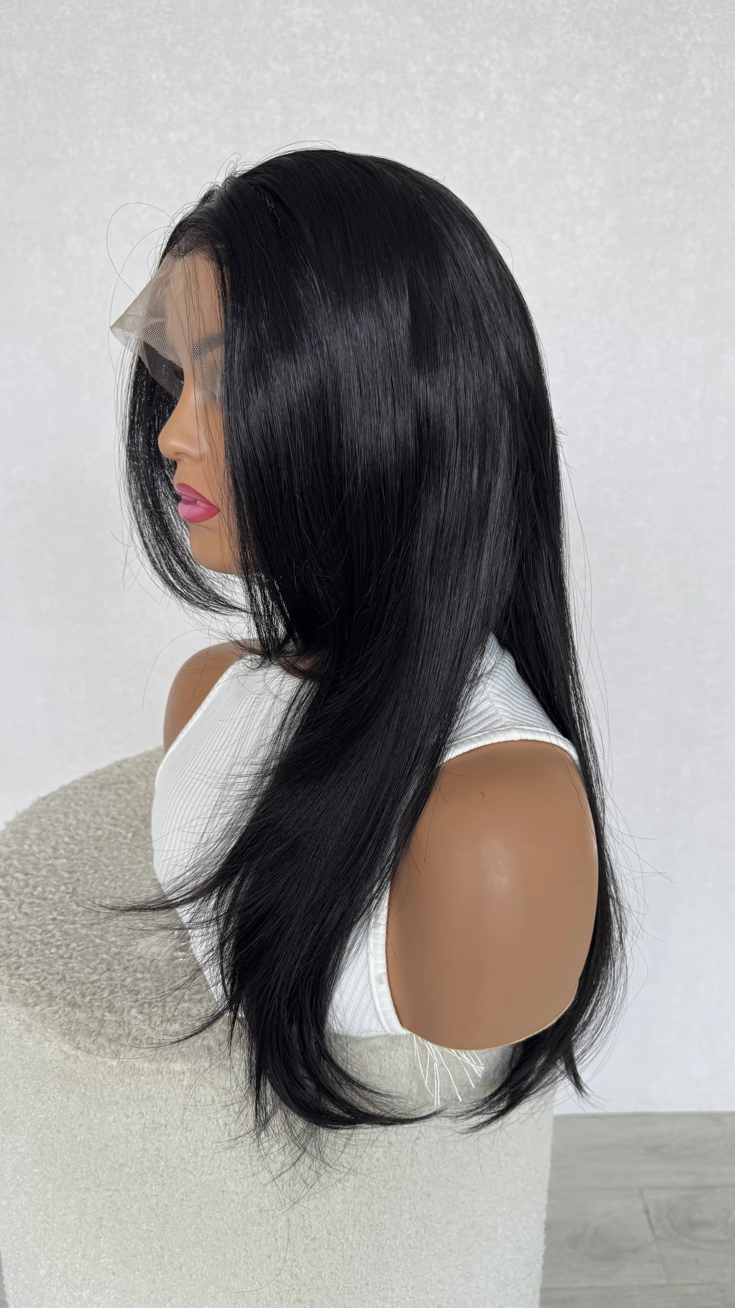 layered hair side on view, nyx black layered synthetic wig.