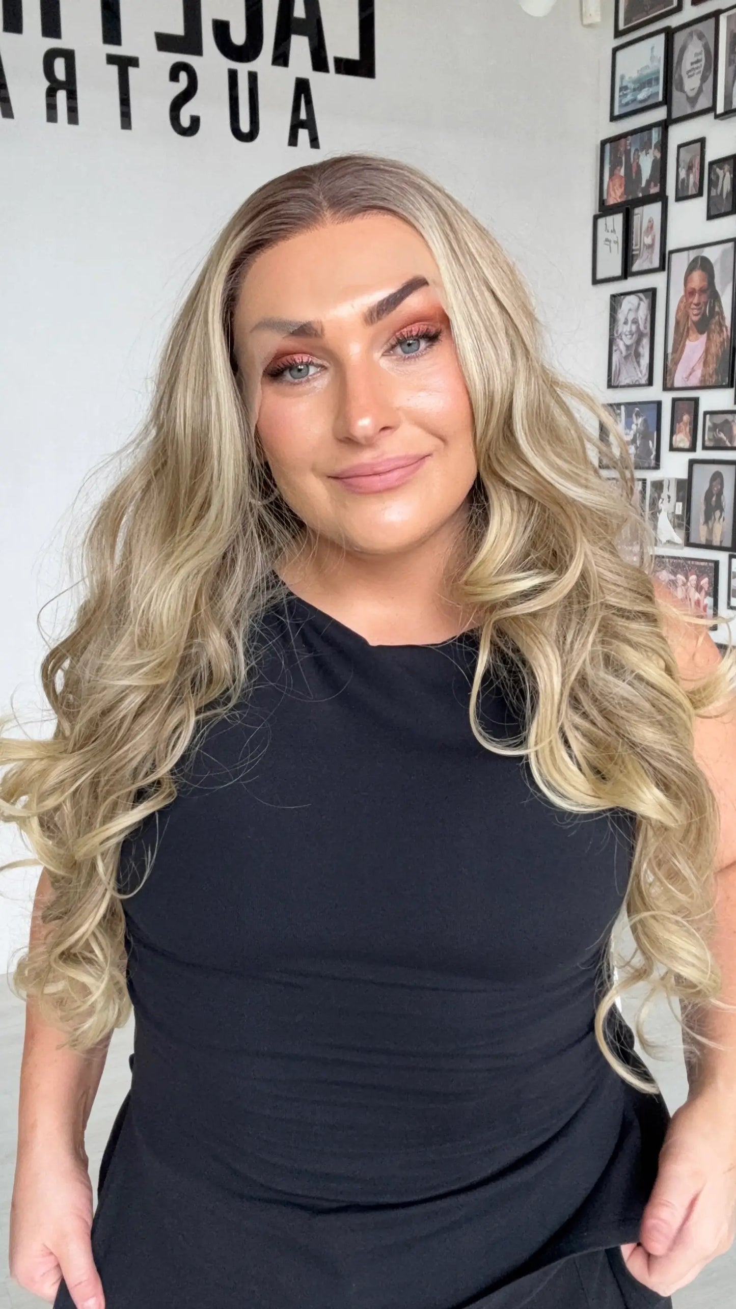 long length curly lacefront, hollywood curls, middle part with root shadow. 