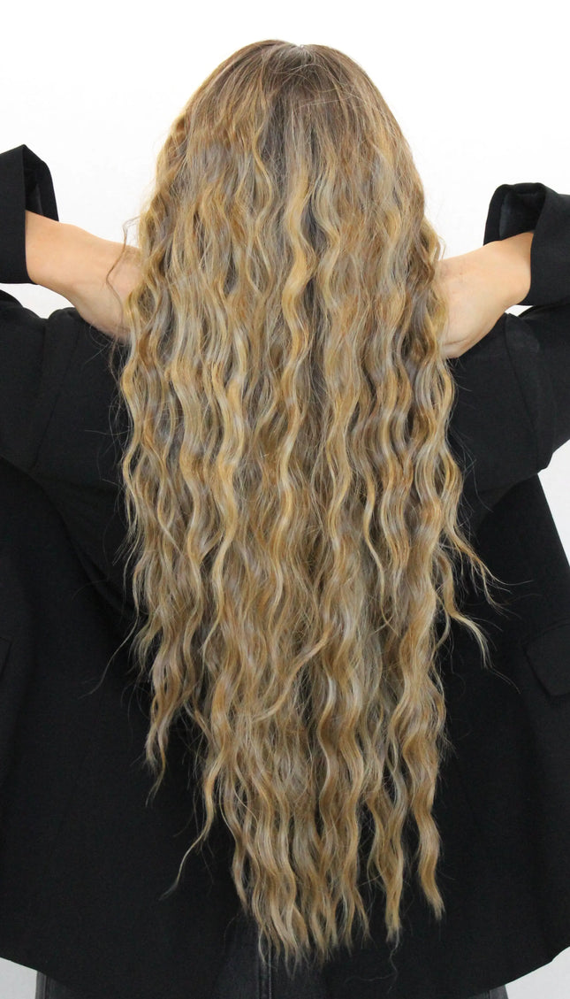 long lacefront wig from behind, wavy brunette hair with highlights.