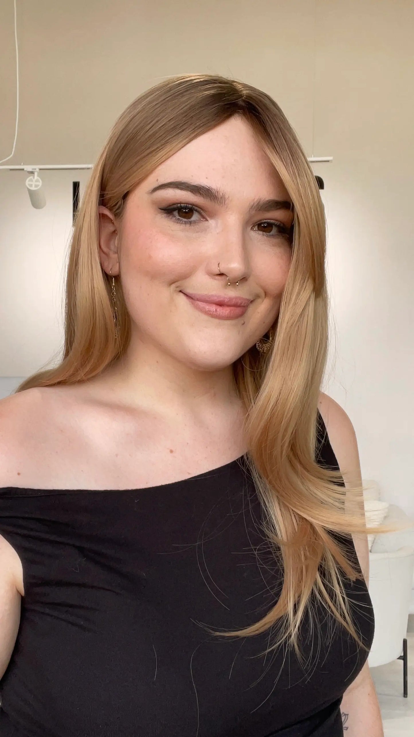 layered long blonde heat safe synthetic wig for women with hairloss. 