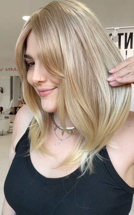 ready to wear, glueless sandy blonde wig with curtain bangs and middle part, heat safe and glueless synthetic, gold coast australia.