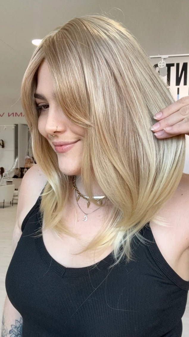 ready to wear, glueless sandy blonde wig with curtain bangs and middle part, heat safe and glueless synthetic, gold coast australia.