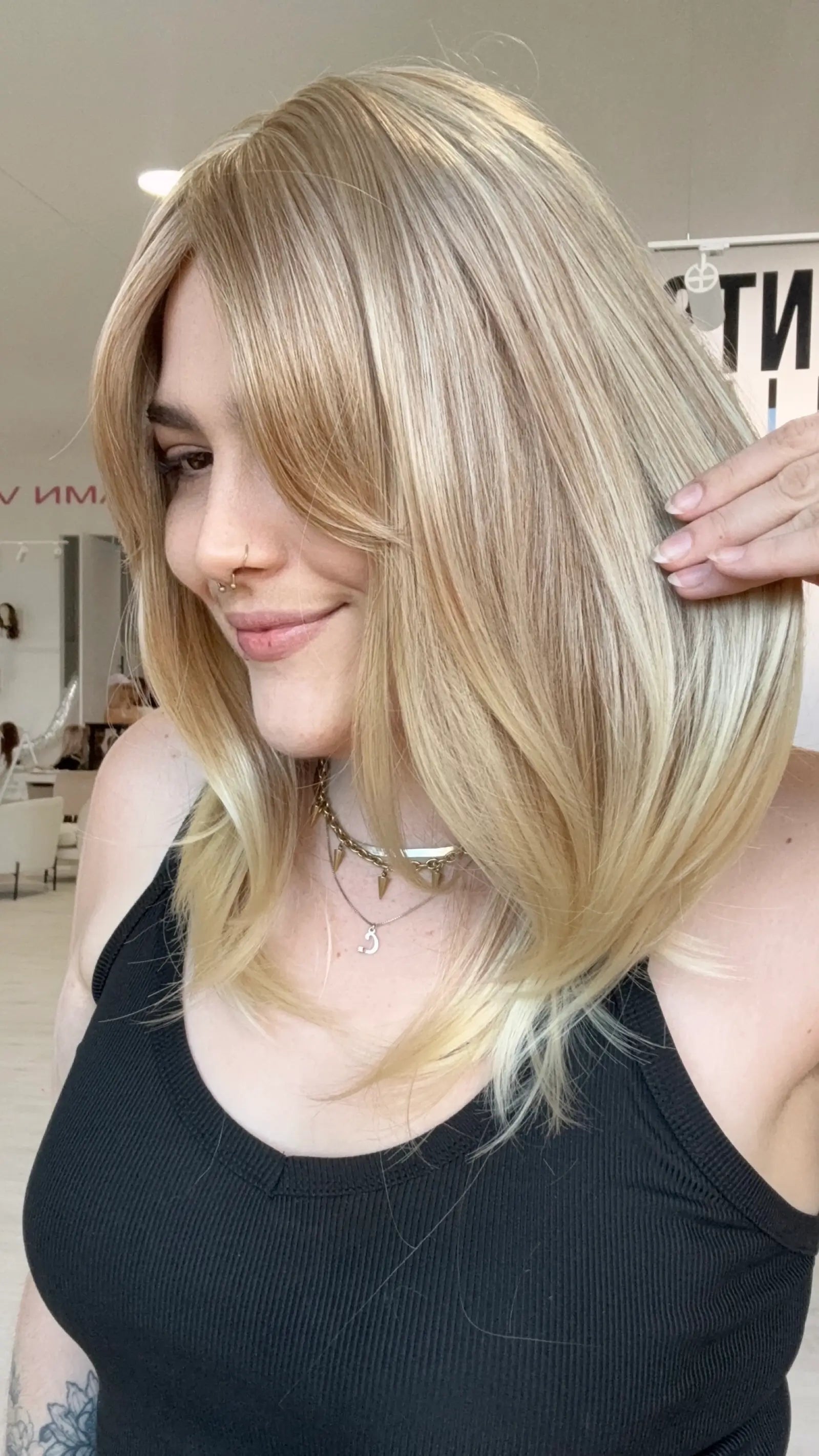 ready to wear, glueless sandy blonde wig with curtain bangs and middle part, heat safe and glueless synthetic, gold coast australia.