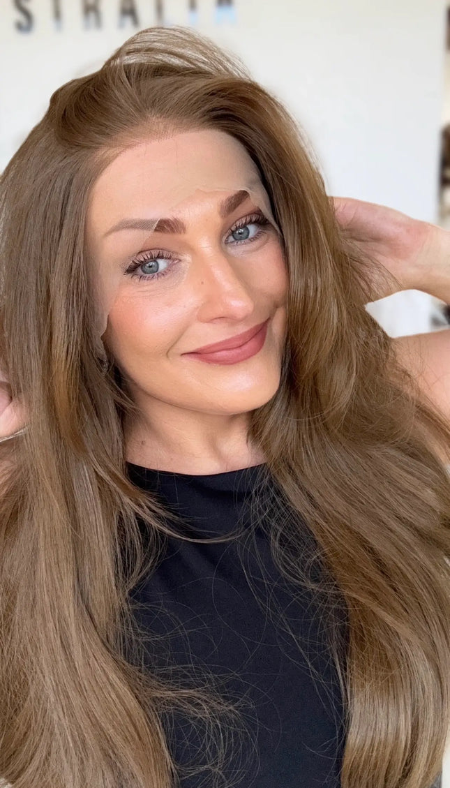 left side part soft warm brunette with layers and bouncy blowout styling. glueless lace front wig cap.