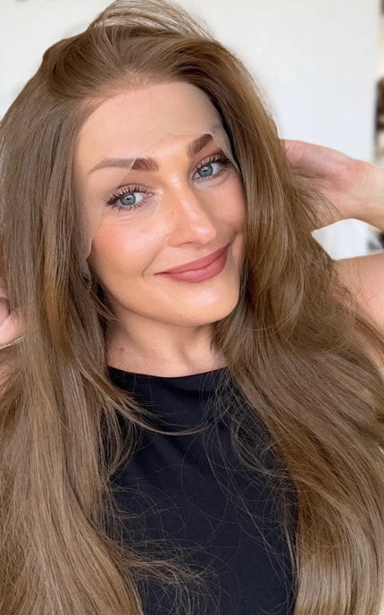 left side part soft warm brunette with layers and bouncy blowout styling. glueless lace front wig cap.