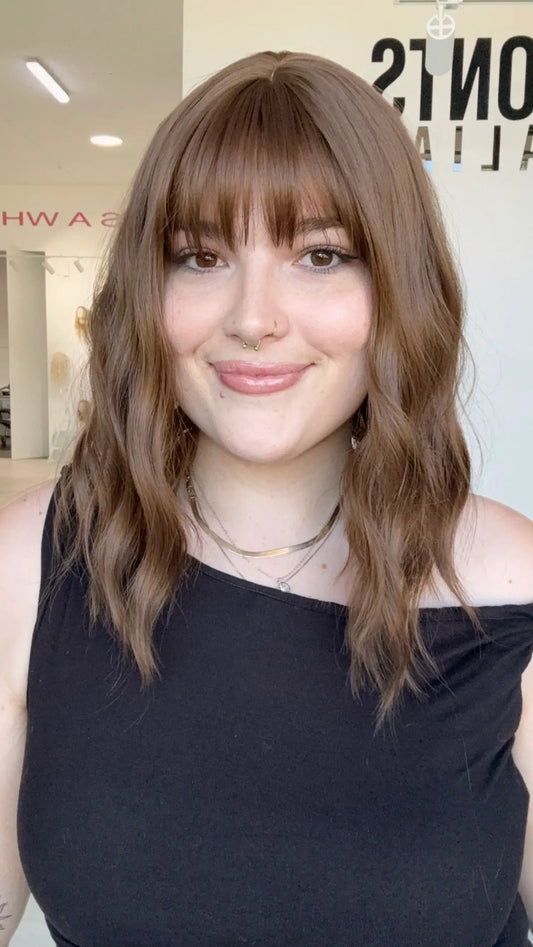 wavy brown hair wig with fringe. 14 inch hair with middle part, heat safe wig australia, gold coast wigs.