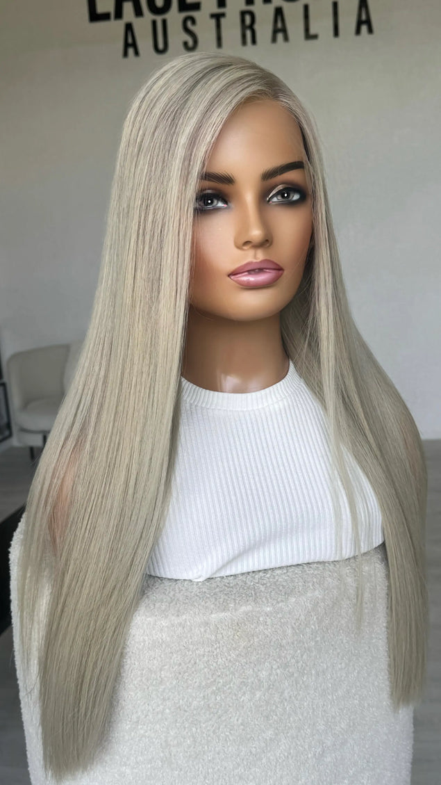 Human hair 26 inch long platinum blonde hair, side part wig. 