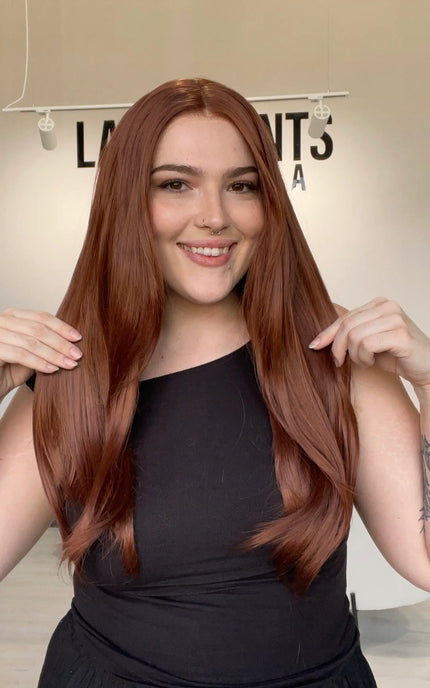 long length red hair heat safe synthetic wig with a glueless wig cap.