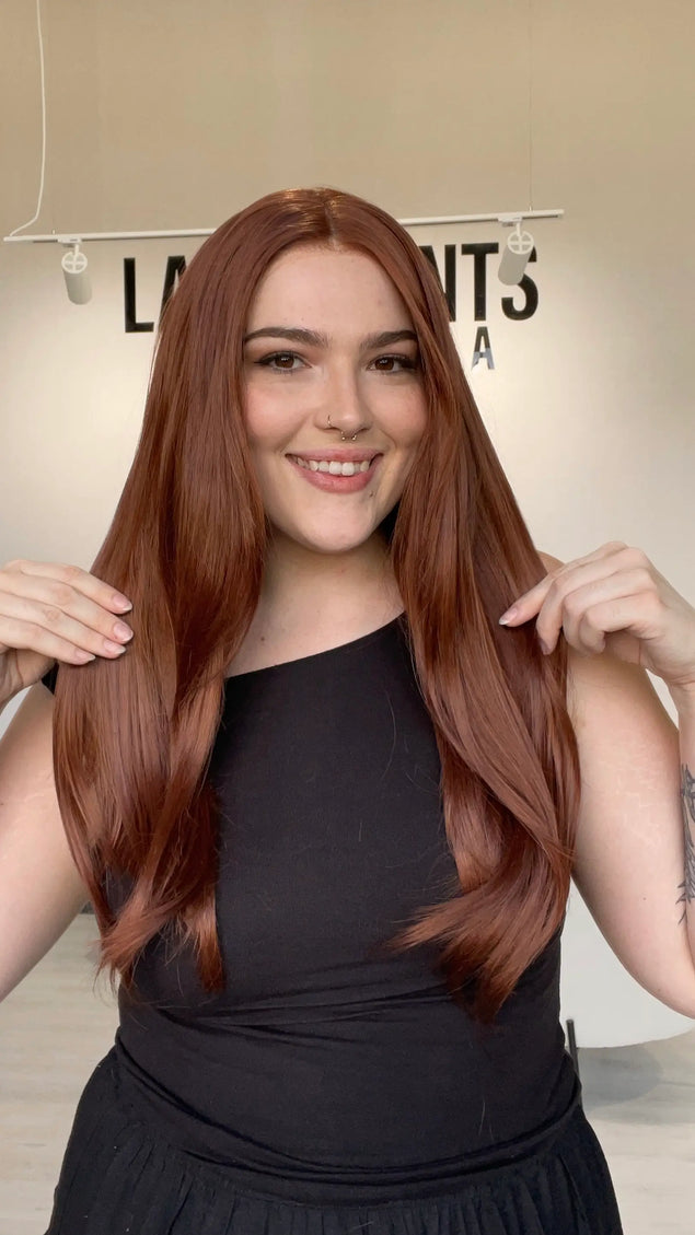 long length red hair heat safe synthetic wig with a glueless wig cap.