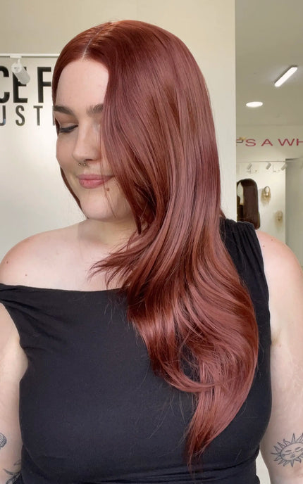heat safe glueless red layered hair wig, changeable parting.