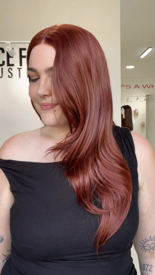 heat safe glueless red layered hair wig, changeable parting.