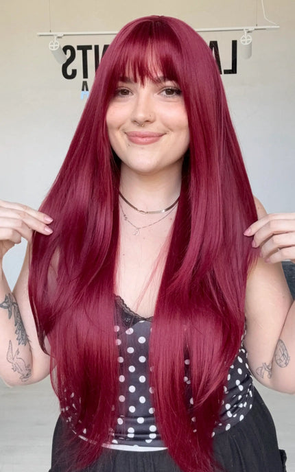 realistic beginner wig, long length with fringe and layers.