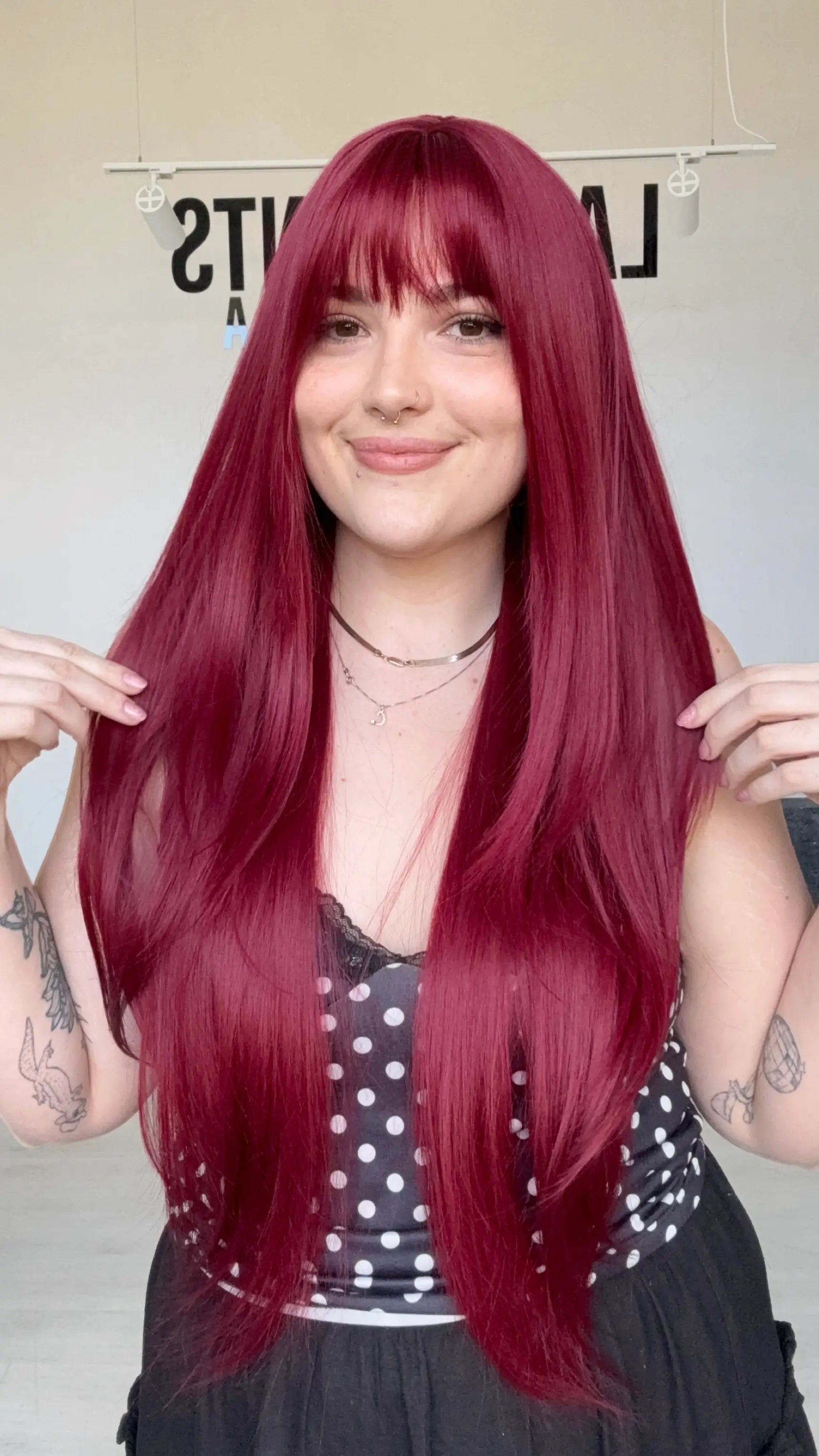 realistic beginner wig, long length with fringe and layers.
