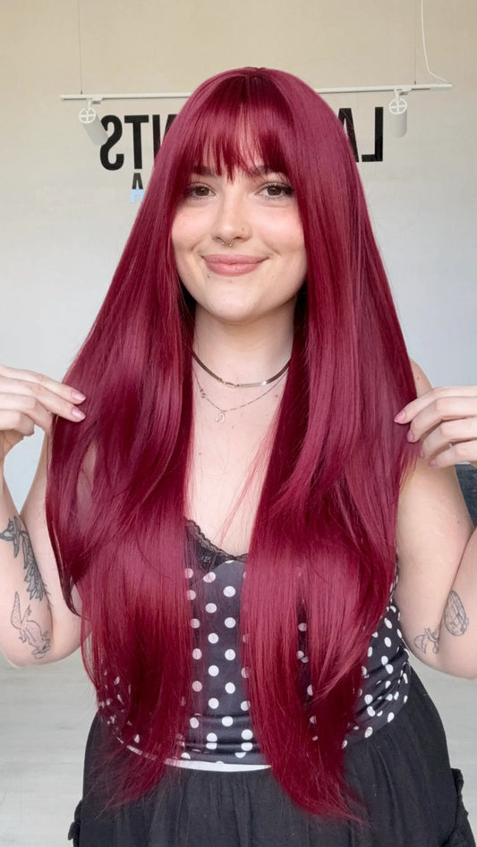 realistic beginner wig, long length with fringe and layers.
