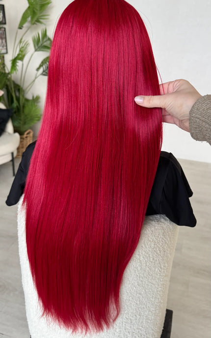 back of the long red hair, holding hair in hand, 26 inch length, heat safe hair. wigs australia.