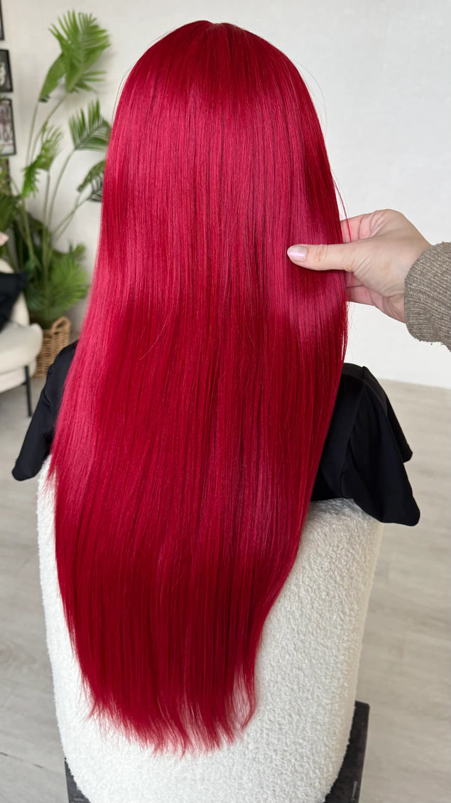 back of the long red hair, holding hair in hand, 26 inch length, heat safe hair. wigs australia.