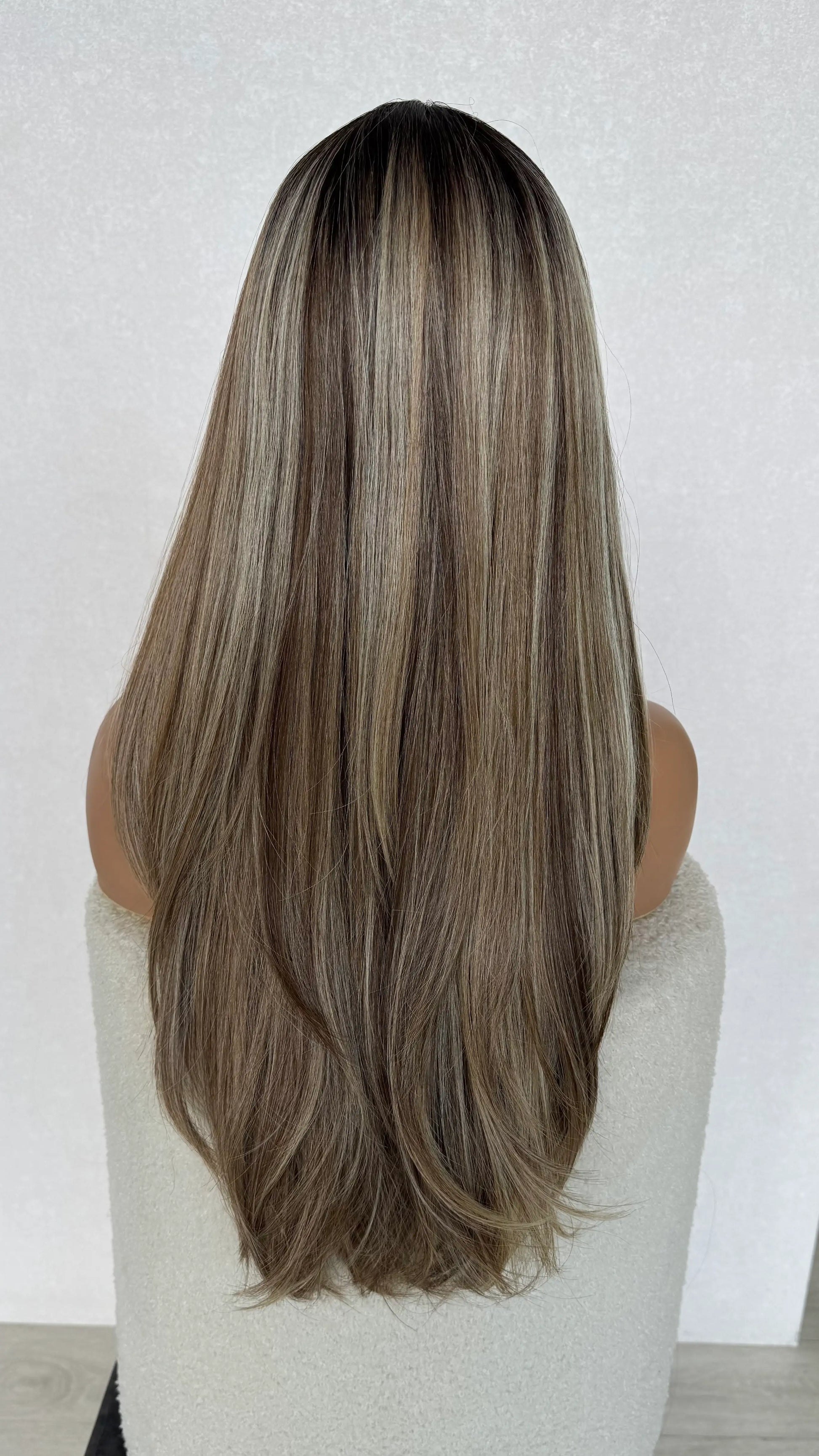 multi-toned blonde lacefront wig with long layers and curtain bangs, australia wigs.