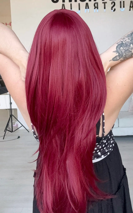 natural looking long length wig from behind, with layers throughout.