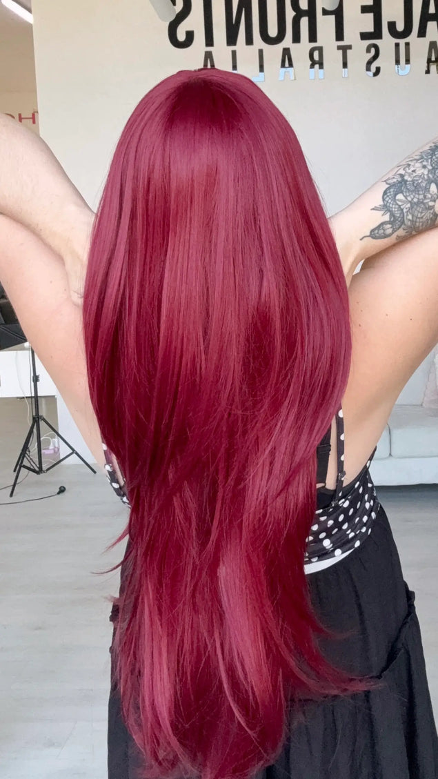 natural looking long length wig from behind, with layers throughout.