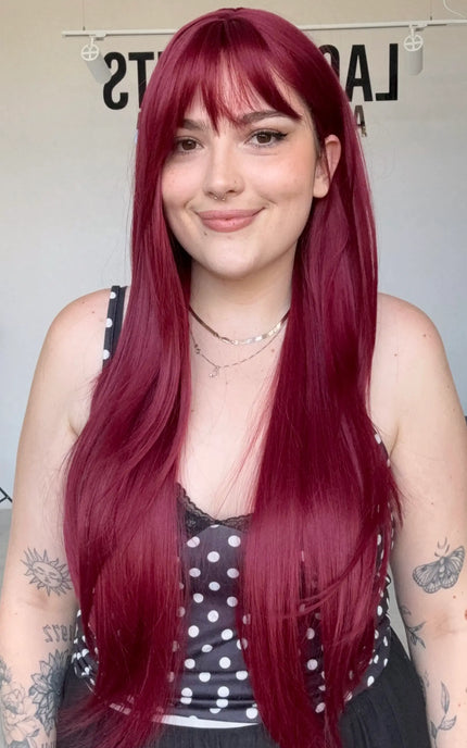 heat safe long synthetic wig for hairloss. With long layers and a fringe.