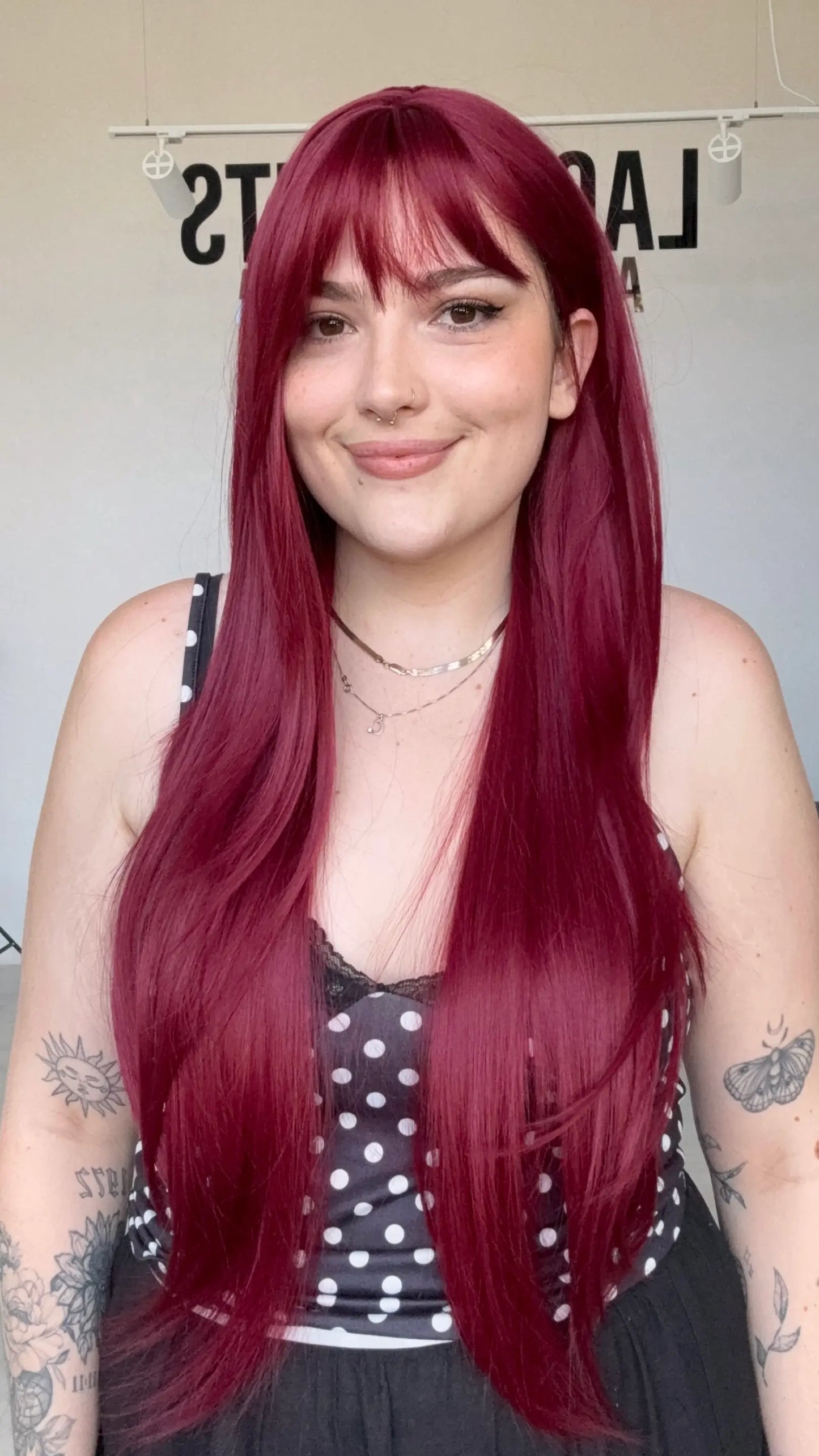 heat safe long synthetic wig for hairloss. With long layers and a fringe.