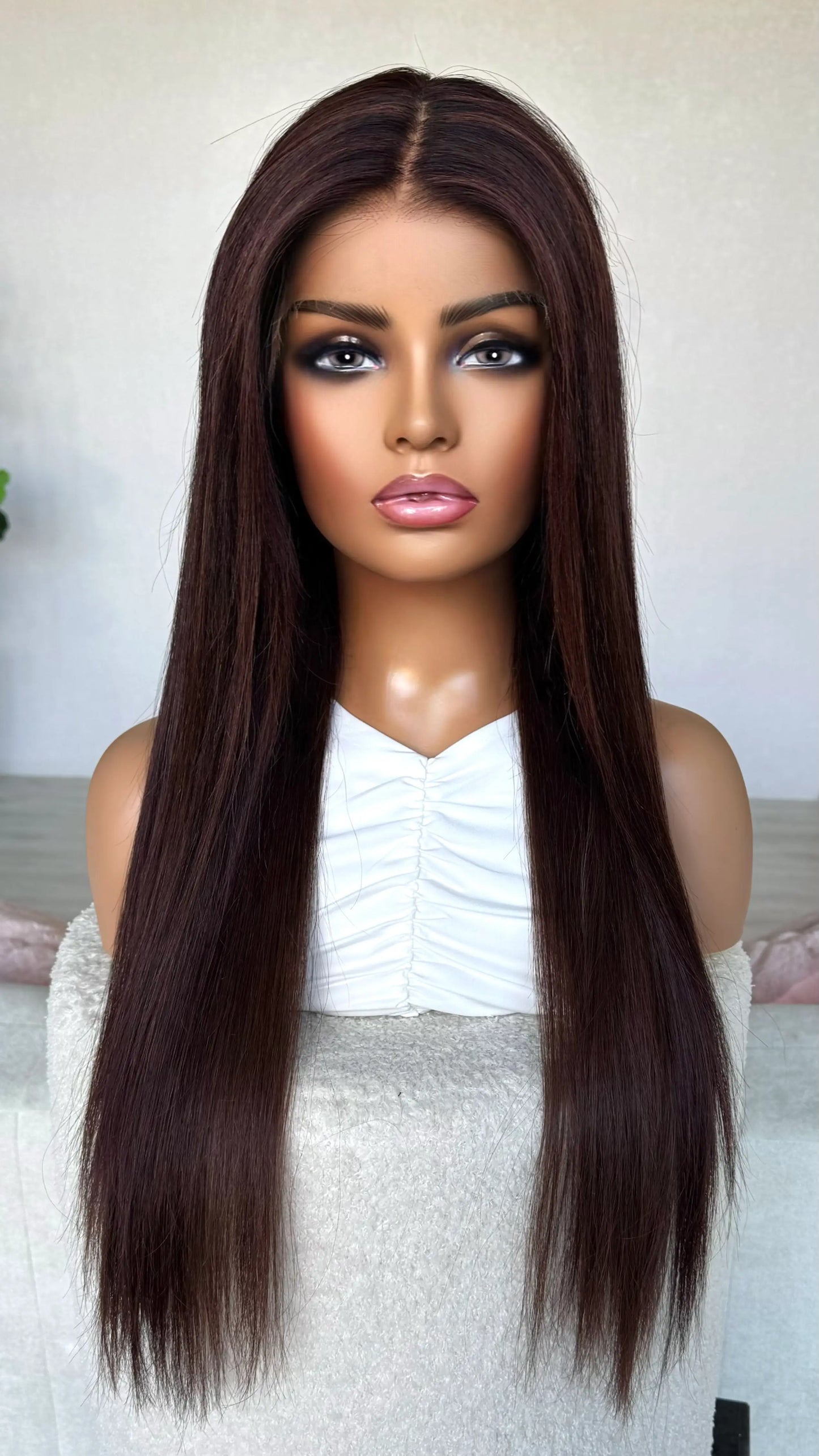 24 inch darkest brunette with burgundy highlights. straight hair, middle part, lacefront wig.