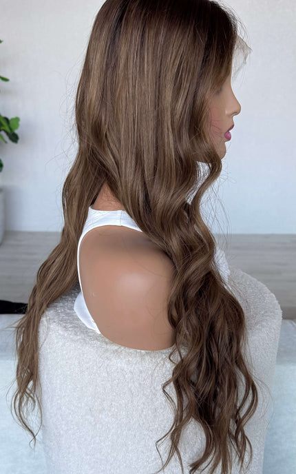 lace front long wavy brunette human hair wig with glueless cap.