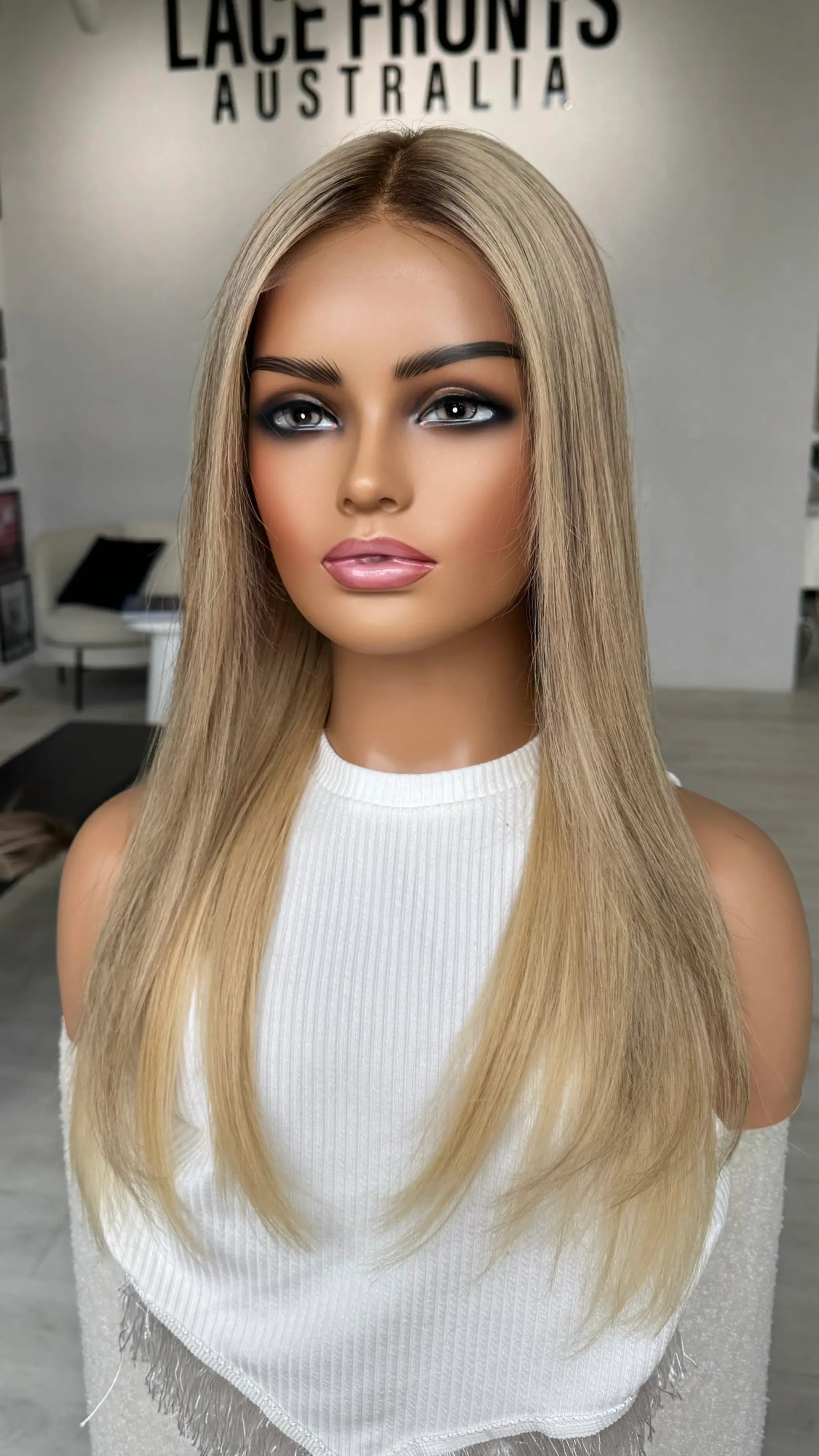 creamy blonde, middle part, long length with layers. medical lacefront wig australia blonde