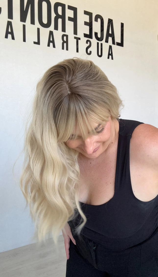fringe synthetic topper heat safe wavy blonde hair.