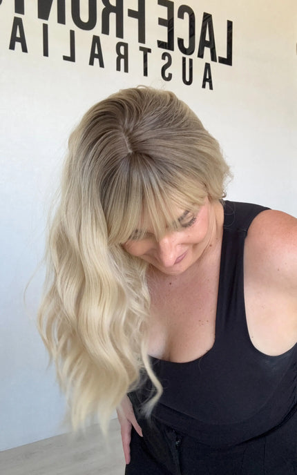 fringe synthetic topper heat safe wavy blonde hair.