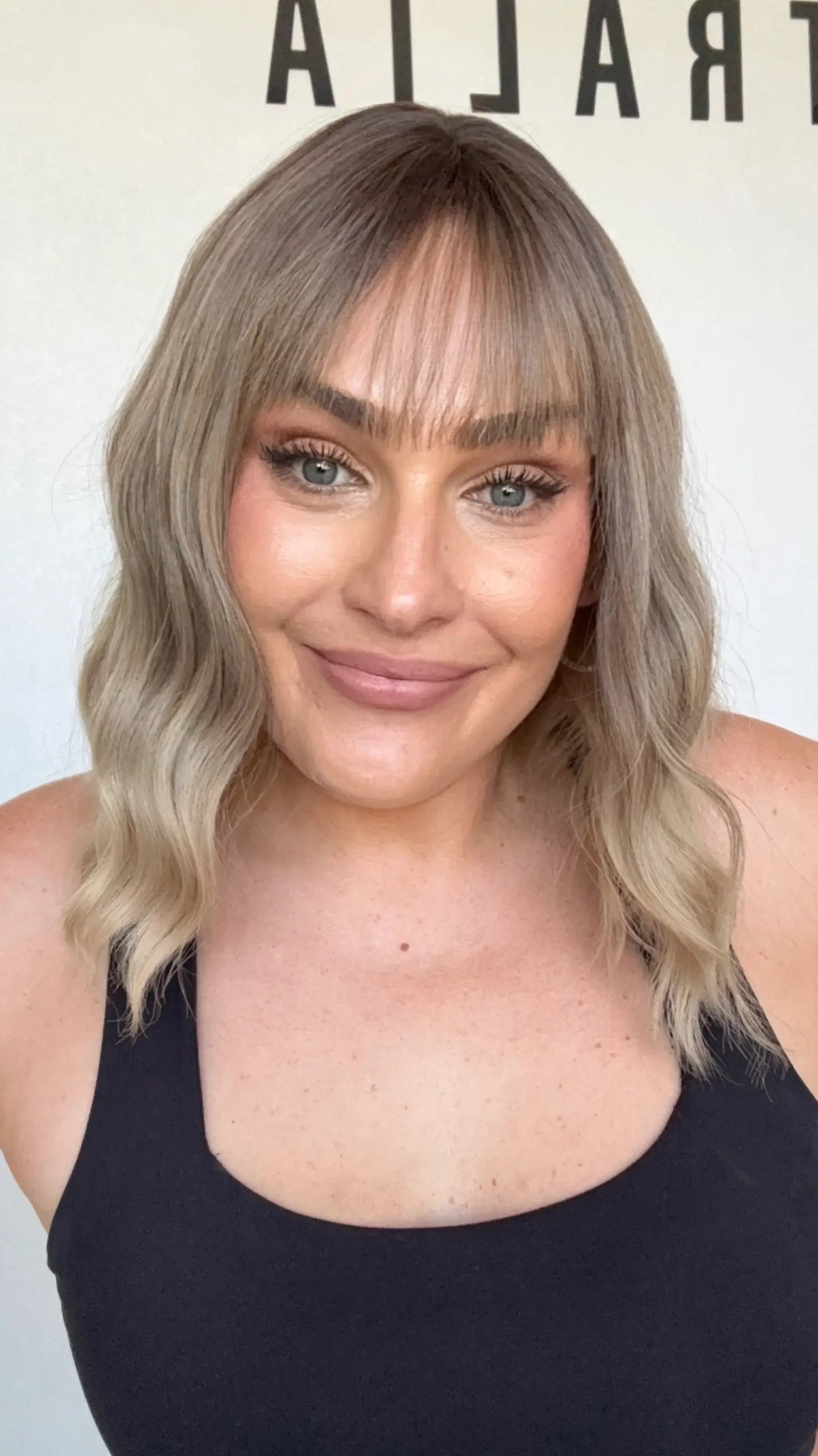 wavy hair fringe wig, middle part, darker root, heat safe glueless wig australia.