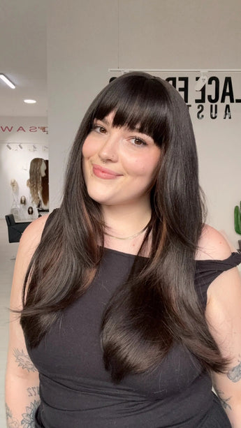 Highlighted dark brown fringe synthetic with heat safe hair and a glueless cap for easy beginner wear.