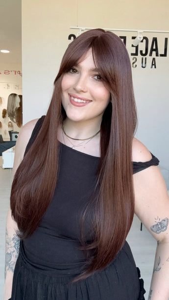 a realistic long length red brunette synthetic wig for hairloss, based in australia.
